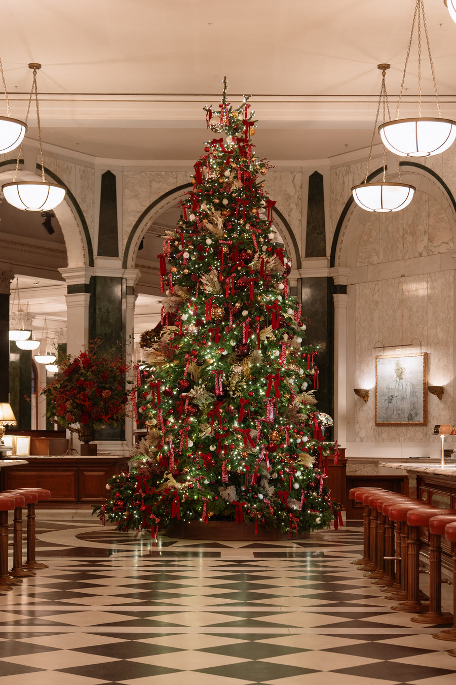 The pile of Macallan-wrapped gifts at the base of the tree